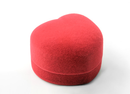 Red wedding ring box on white background.の写真素材