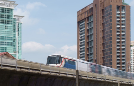 Modern train on building background, Bangkok, Thailand. Movement.のeditorial素材