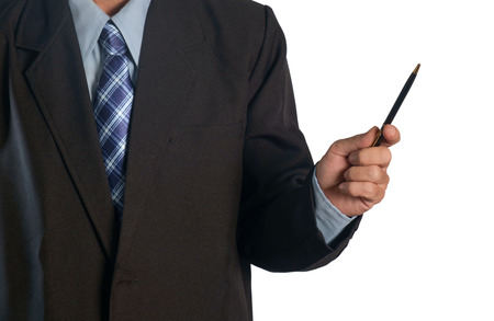 View of businessman holding pen on white background.の写真素材