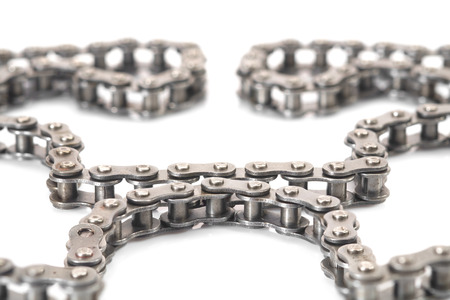 View of dirty roller chain on white background.の写真素材