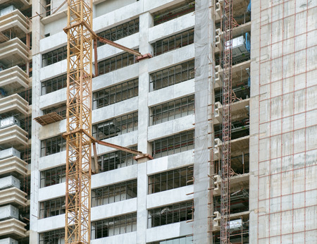View of balconies of apartment building in construction site.