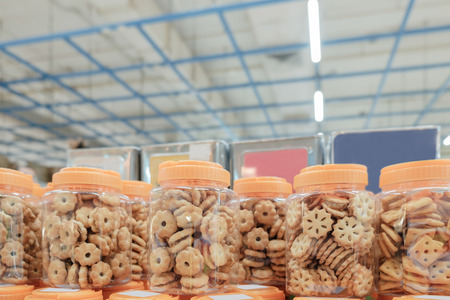 Snack in container on shelf in the store. Shallow depth of field.