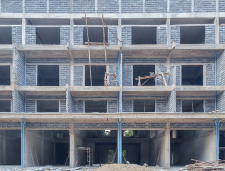 Apartment building in construction site.