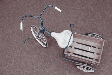 View of retro tricycle on the ground. Top view.の写真素材