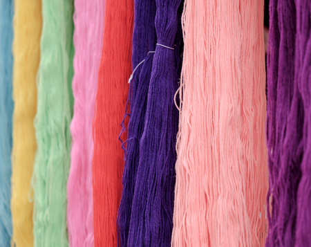 Abstract colorful background of yarn. Shallow depth of field.の写真素材