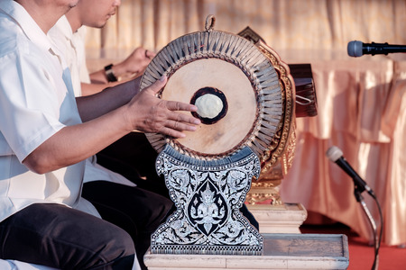 View of musician playing thai drum. Movement.の写真素材