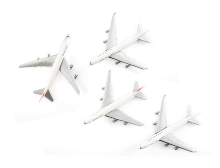 Plastic toy airplane on white background. Top view.の写真素材