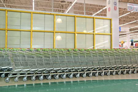 View of shopping cart in the mall. Shallow depth of field.の写真素材