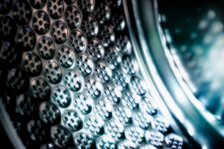 Inside of washing machine, abstract blur background. Dark tone.の写真素材