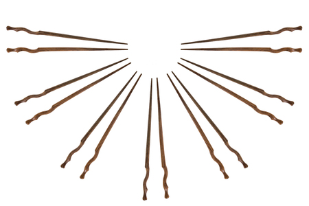 View of chopsticks on white background.