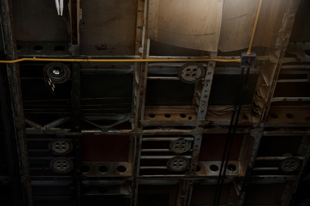 View of iron structure on ceiling. Dark tone.の写真素材