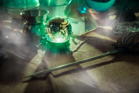 View of crystal ball on old and dirty canvas. Dark tone.の写真素材
