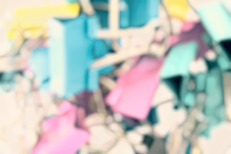 Blur of heap of paper clip on white background.