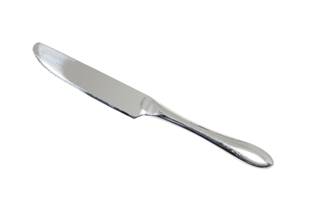 Stainless knife on white background. Top view.