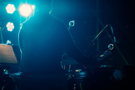 BANGKOK, THAILAND - DECEMBER 23: View of musician playing drum in concert at night. Movement, Soft focus, Royal palace of Ananta Samakhom on December 23,2017 in Bangkok, Thailand.のeditorial素材