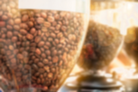 Blur of coffee beans in the bottle of coffee maker.の写真素材