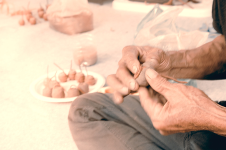 Close up hands male sculpt with clay. Folk Art. Movement.の写真素材