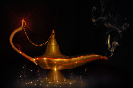 Aladdin lamp with smoke on dark background. Soft focus.の写真素材