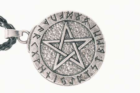 Pentacle necklace on white background. Top view.の写真素材