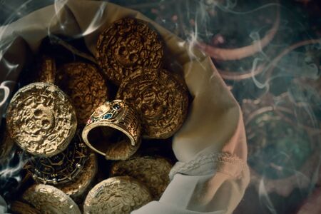 View of treasure with smoke in treasure cave. Dark tone.の写真素材
