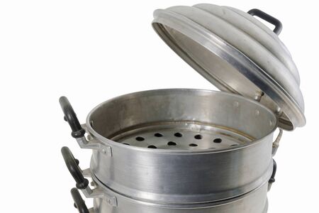 Old aluminum steam boiler on white background.の写真素材