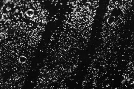 View of water drop on dark background. Movement.の写真素材