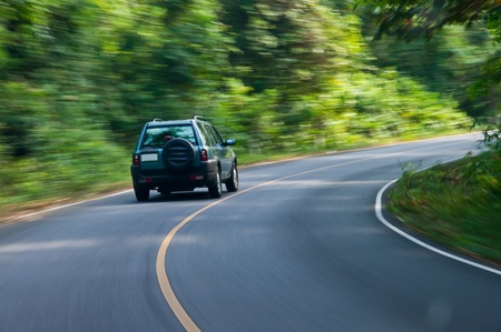 car on the road wiht motion blur background. 