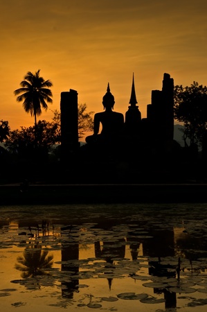 Silhouette of buddha staueの写真素材