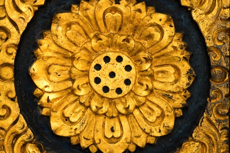 Traditional Thai style on temple door in Thailandの写真素材