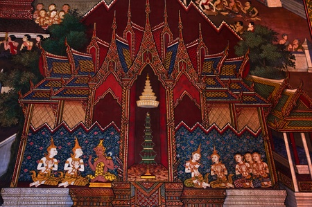 Traditional Thai art on a wall  at the Temple of dawn, Bangkok, Thailand 