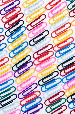 Colorful paper clip isolated backgroundの写真素材