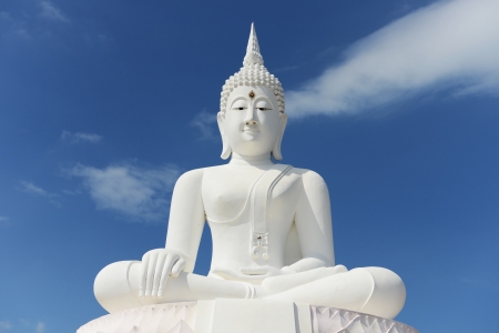 White buddha status on blue sky background の写真素材