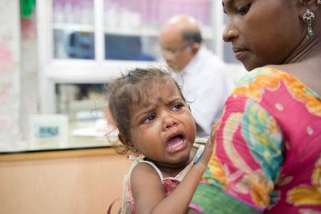 GAYA,BIHAR, INDIA- October 14, 2017: India baby crying in hospitalのeditorial素材