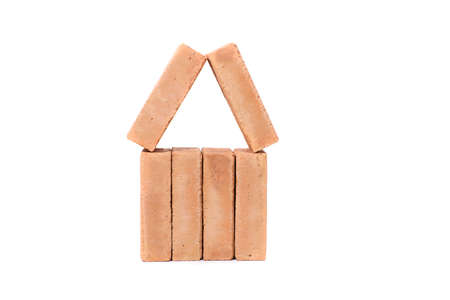 Red bricks isolated on white background. Solid clay bricks used for construction.