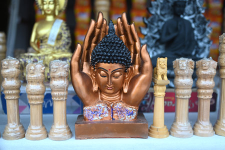 Buddha statue figures souvenir on display for sale. Handicrafts and souvenir shop displayの写真素材
