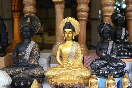 colorful Buddha sculpture sitting in meditation.の写真素材