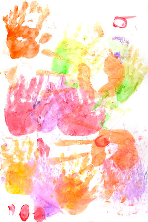 Colorful children's hand prints on a white background.の写真素材