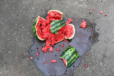 Close-up of a broken watermelon on the ground