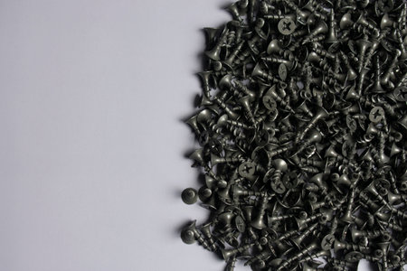 Many metal screws, texture background, Copy Spaceの写真素材