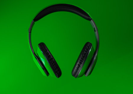 Headphones on green backgroundの写真素材