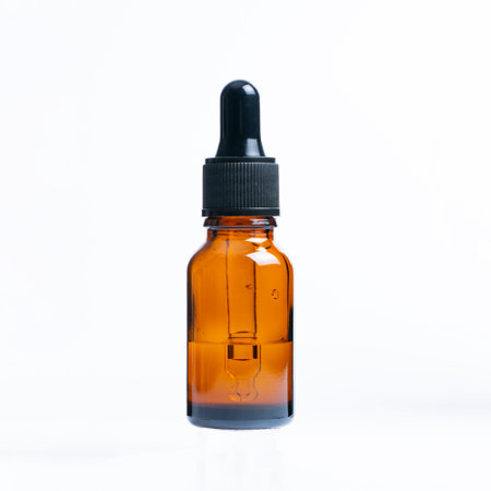 Close up, Dropper bottle Mock up for cosmetic skin care medical product Essential oil isolated on white background.の写真素材