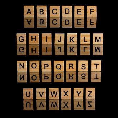 Color alphabet on black background