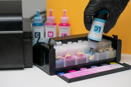 Refilling Inkjet Printer Ink Tanksの写真素材