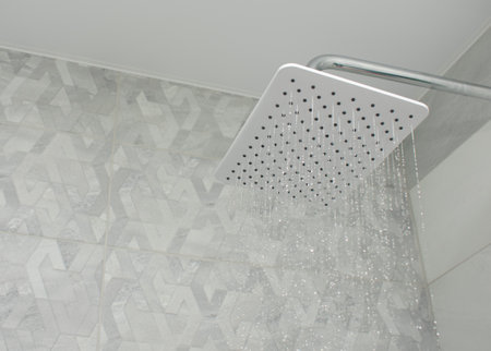 Jets of clean water flowing in the shower cabin. selective focus.の写真素材