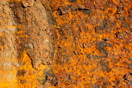 Rust of metals.Corrosive Rust on old iron with a hole. Rusted orange painted metal wall. Rusty metal...