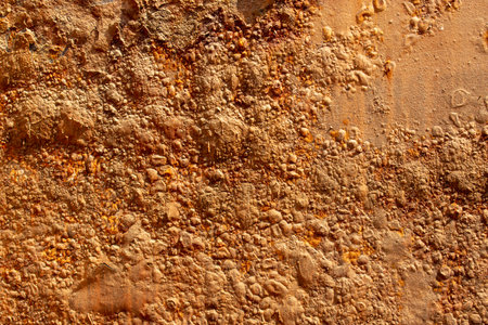 Rust of metals.Corrosive Rust on old iron with a hole. Rusted orange painted metal wall.