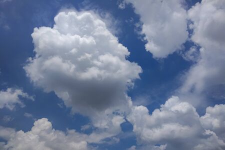 photo of white clouds and blue skyの写真素材