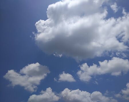 photo of white clouds and blue skyの写真素材
