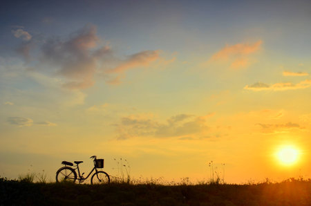bicycle and beautiful sunsetの写真素材