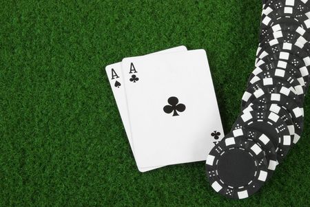 Black poker chips an two acesの写真素材